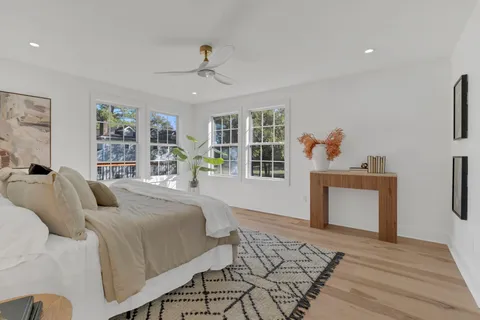 a bed room with a bed and dresser