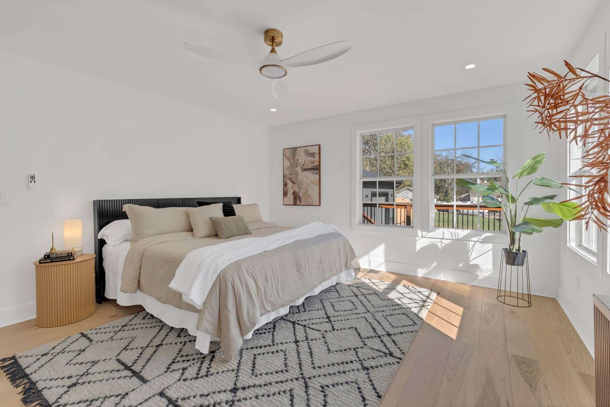 568 West Campbell Road Goodlettsville, TN 37072 - Photo 14 of 27 a bed room with a bed and a large window