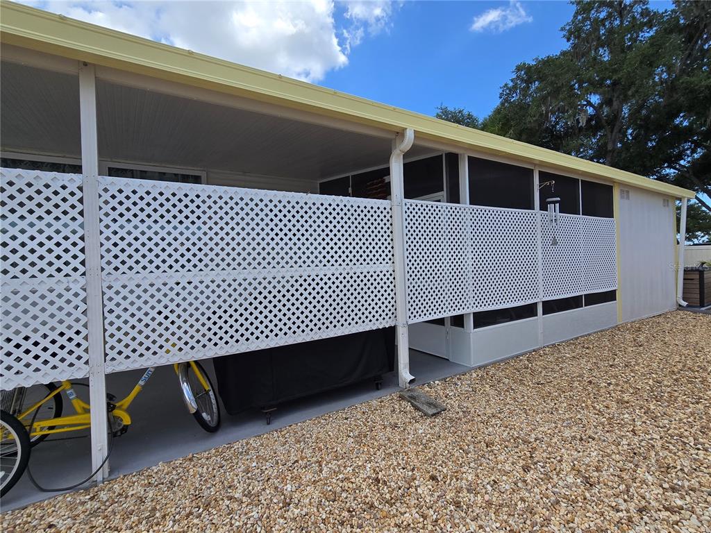 5619 Bayshore Road, Unit 435 Palmetto, FL 34221 - Photo 37 of 56 a view of a balcony with wooden fence