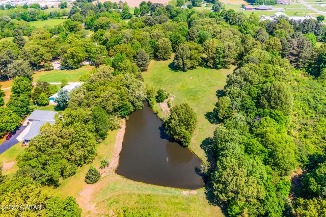 a view of a lake with a house