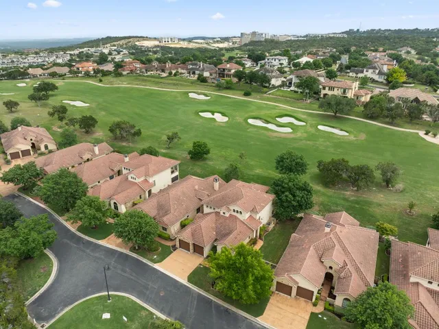 an aerial view of a house with a garden