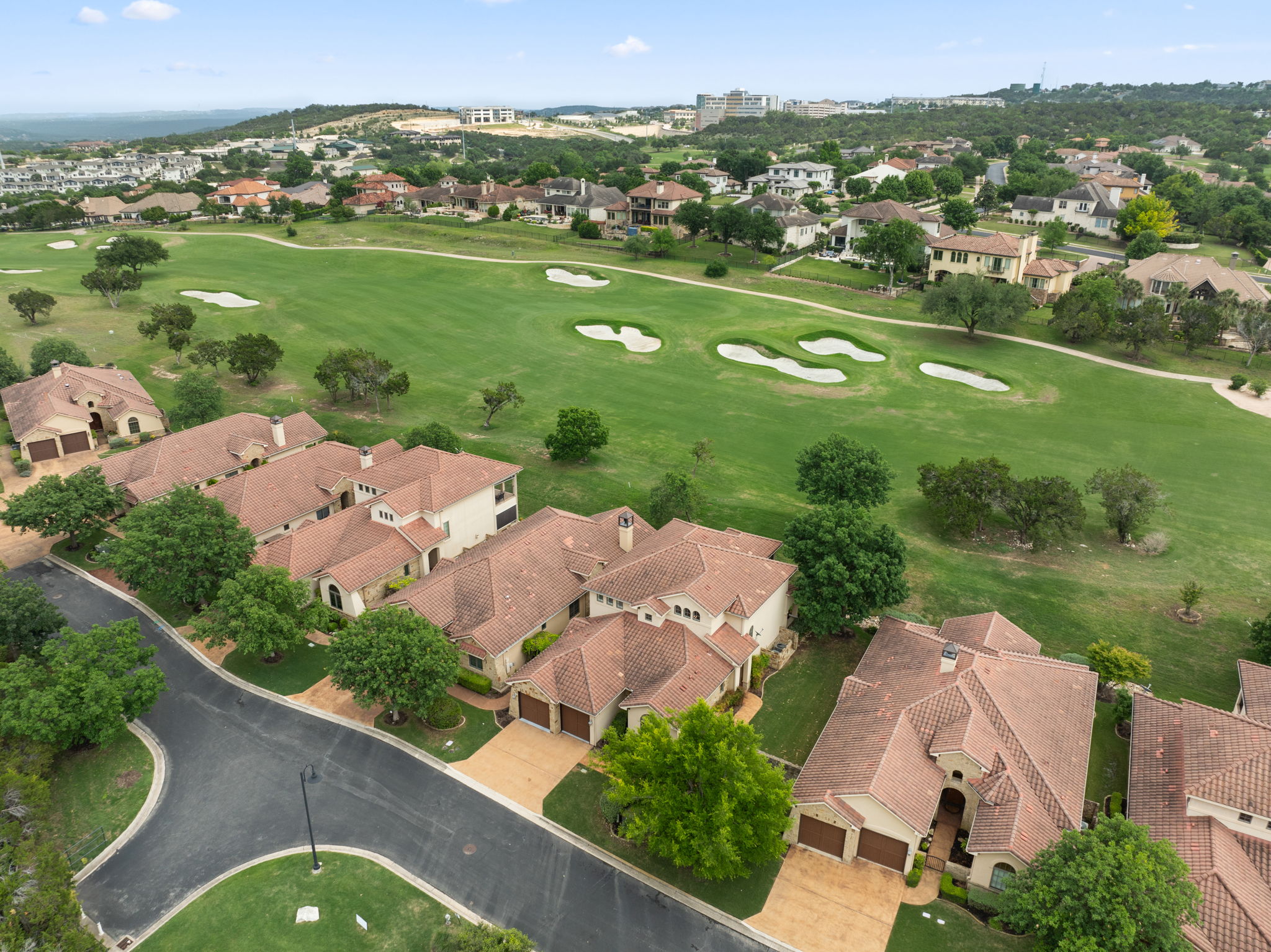 15 Borello Drive Austin, TX 78738 - Photo 2 of 36 an aerial view of a house with a garden