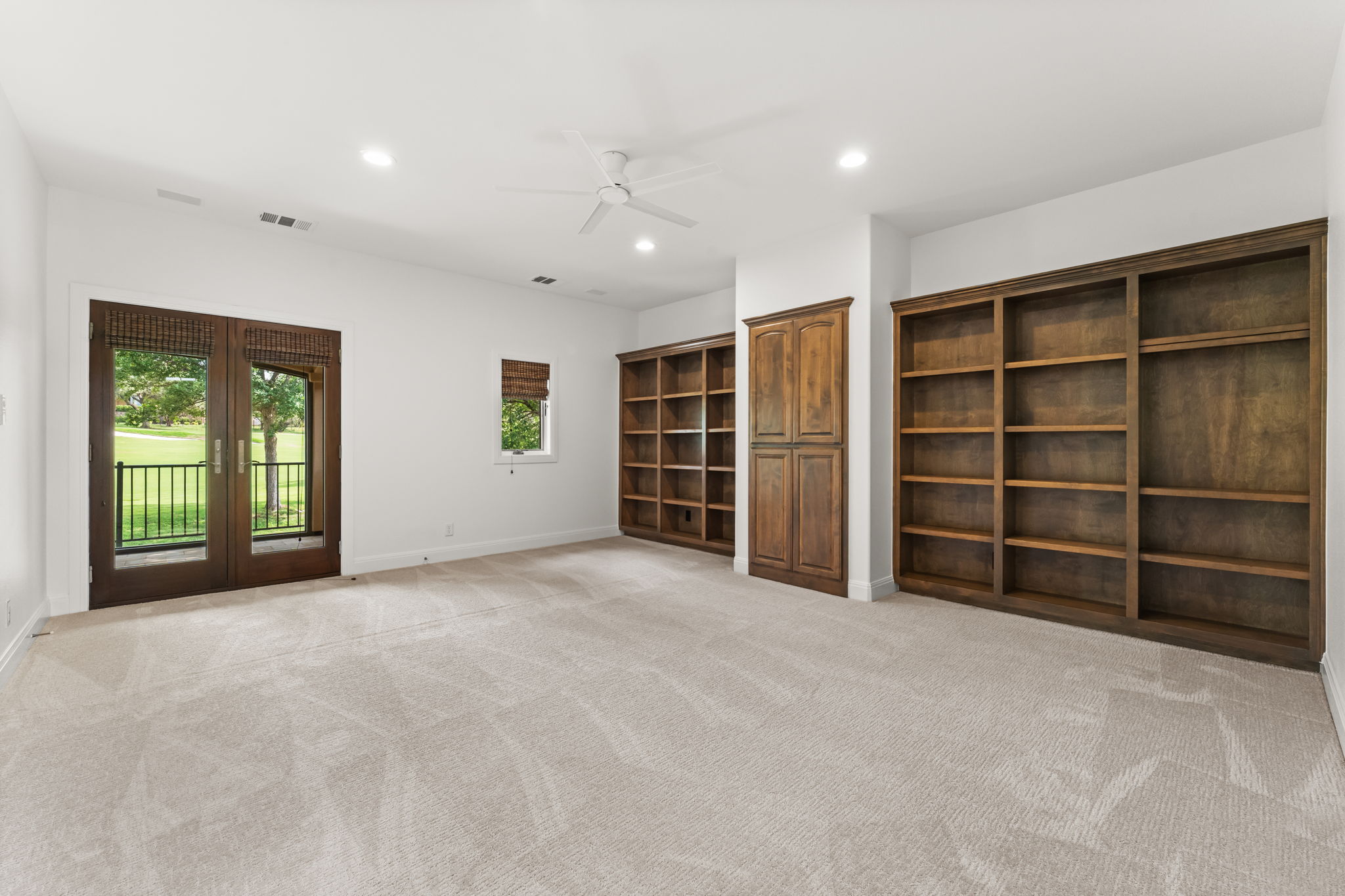 15 Borello Drive Austin, TX 78738 - Photo 22 of 36 a view of an empty room with a cabinet and a window