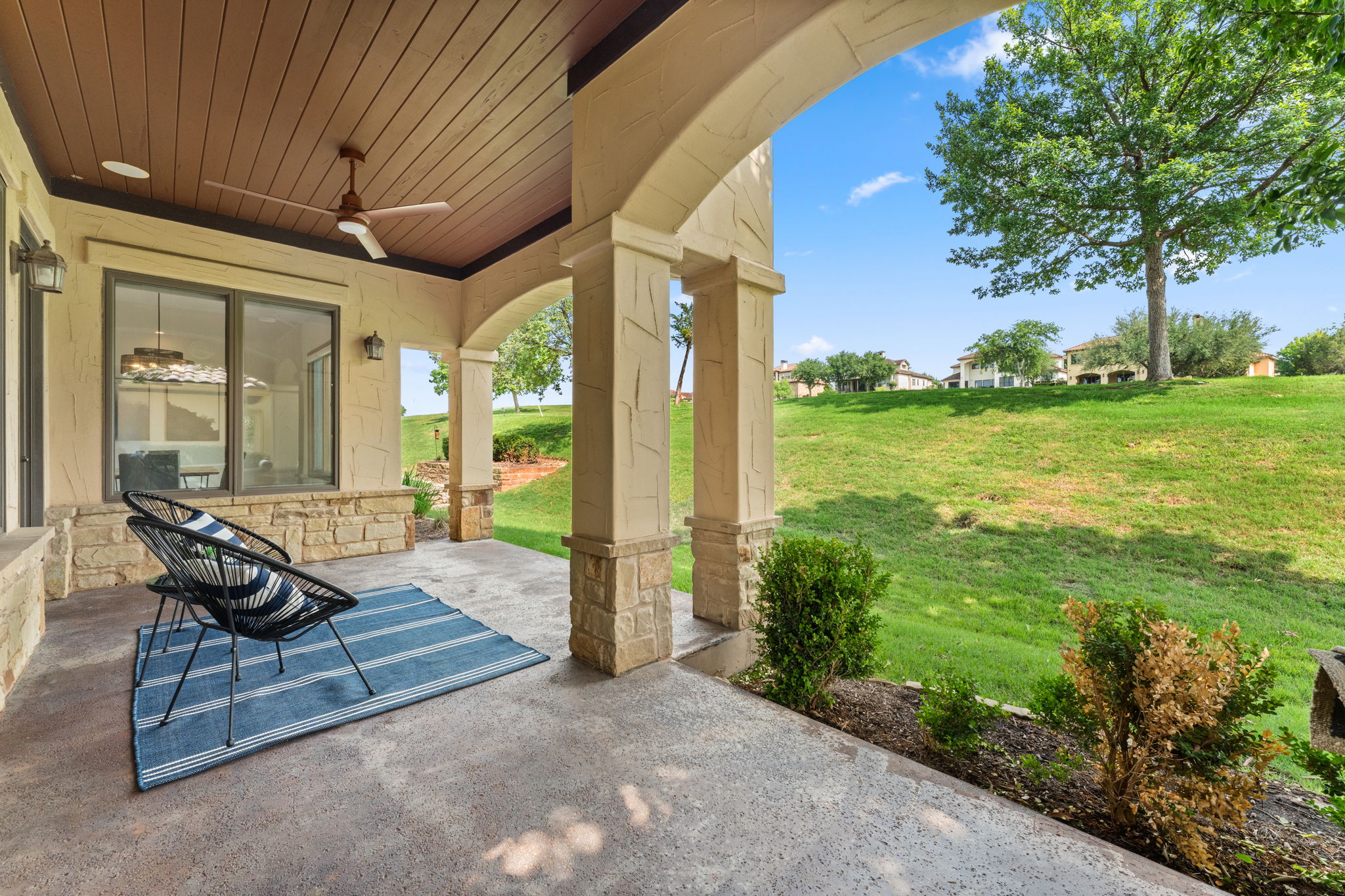 15 Borello Drive Austin, TX 78738 - Photo 32 of 36 a building outdoor space with patio furniture and garden