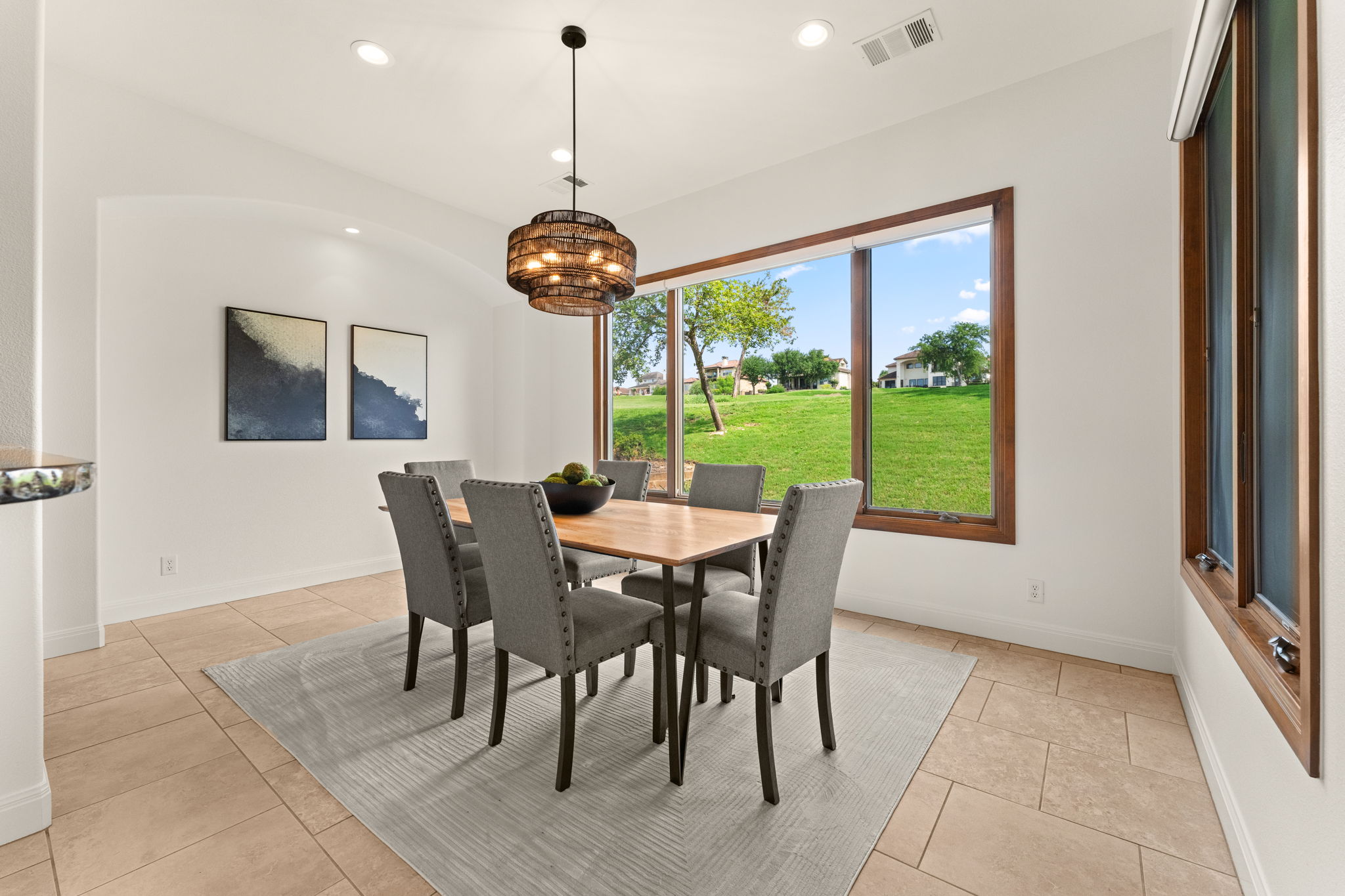 15 Borello Drive Austin, TX 78738 - Photo 9 of 36 a view of a dining room with furniture window and outside view