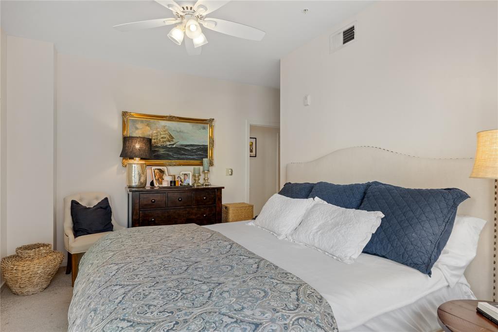 1600 Barton Springs Road, Unit 5301 Austin, TX 78704 - Photo 4 of 19 Bedroom featuring light carpet and a ceiling fan
