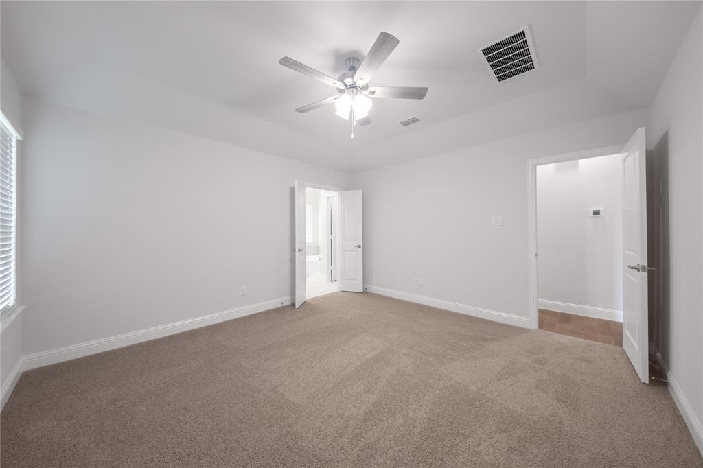 218 Freedom Trail Forney, TX 75126 - Photo 12 of 27 Primary Bedroom