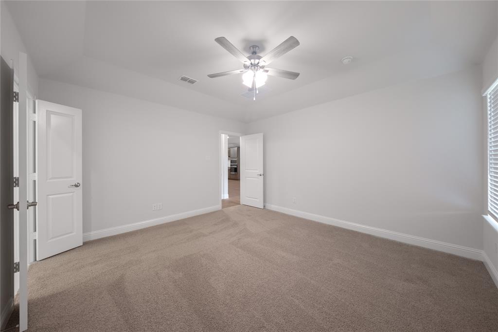 218 Freedom Trail Forney, TX 75126 - Photo 13 of 27 Primary Bedroom