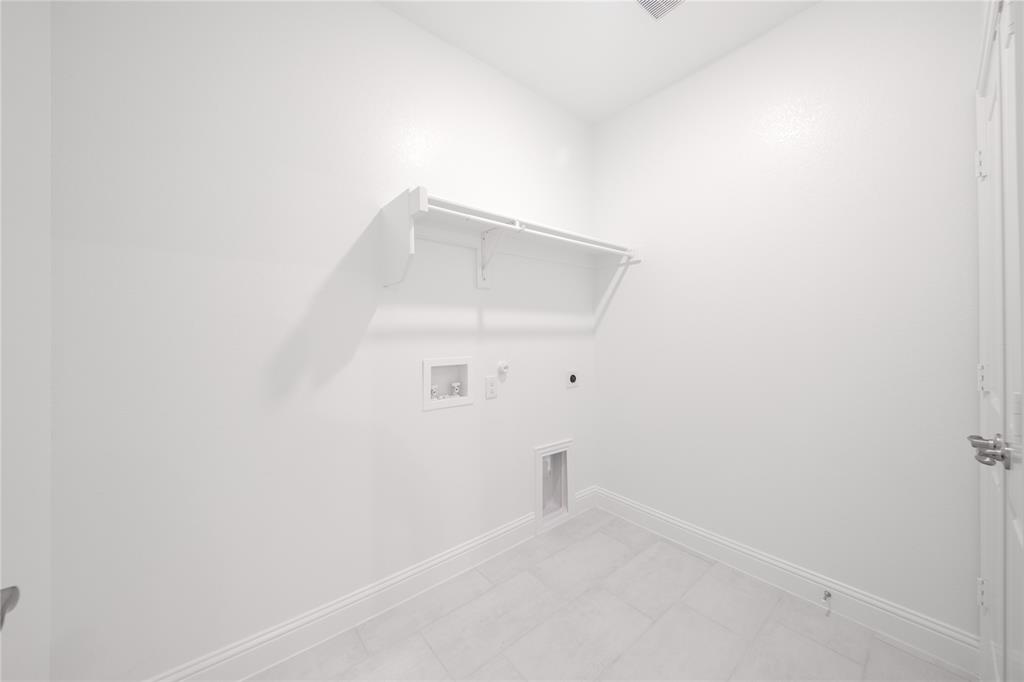 218 Freedom Trail Forney, TX 75126 - Photo 24 of 27 Laundry