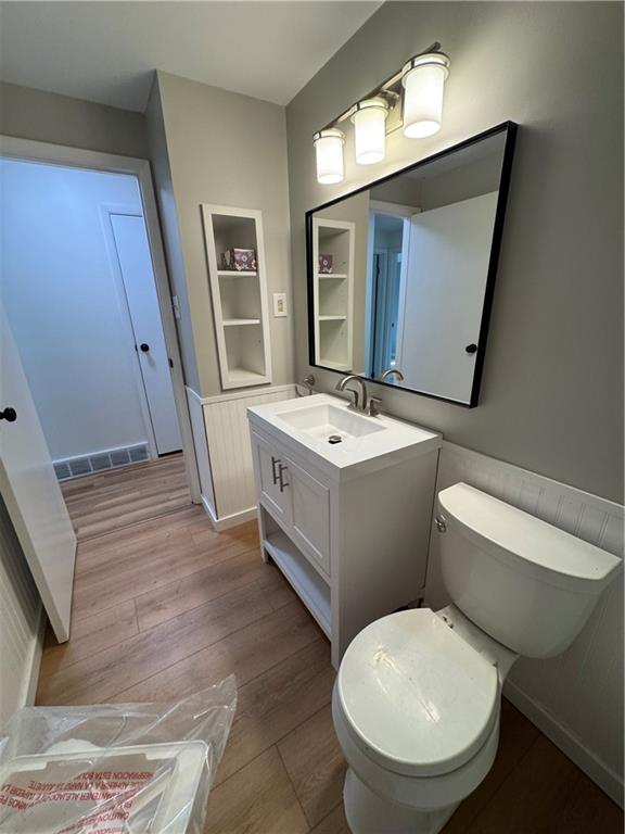 111 Tree View Drive Coraopolis, PA 15108 - Photo 19 of 29 a bathroom with a toilet sink and mirror
