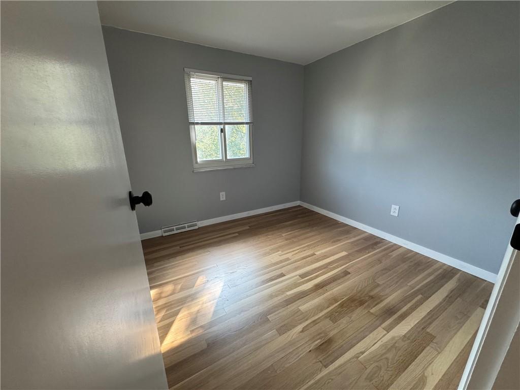 111 Tree View Drive Coraopolis, PA 15108 - Photo 22 of 29 an empty room with a window