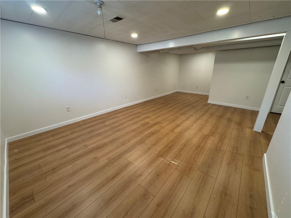 111 Tree View Drive Coraopolis, PA 15108 - Photo 26 of 29 an empty room with wooden floor