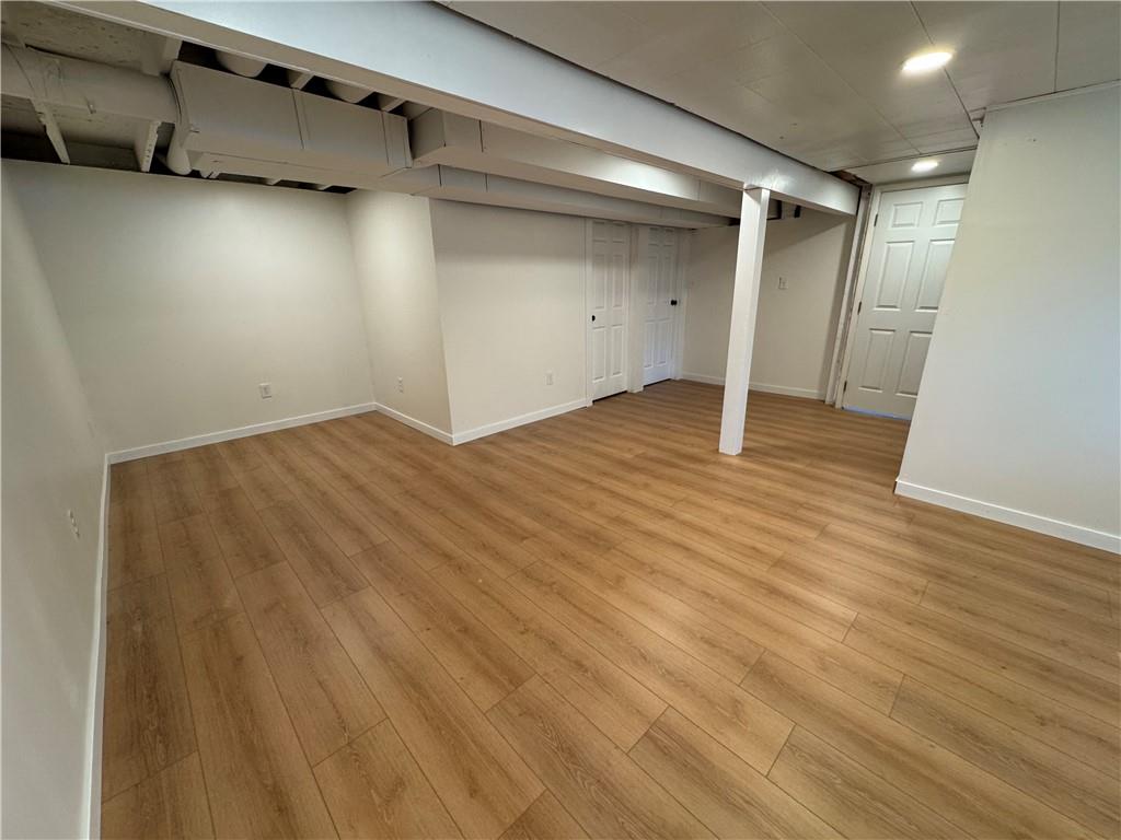 111 Tree View Drive Coraopolis, PA 15108 - Photo 27 of 29 a view of empty room with wooden floor