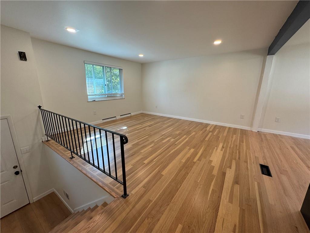 111 Tree View Drive Coraopolis, PA 15108 - Photo 8 of 29 a view of a hallway view with wooden floor and staircase