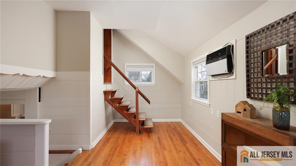 333 Melrose Avenue Middlesex, NJ 08846 - Photo 14 of 36 a view of entryway with wooden floor and stairs