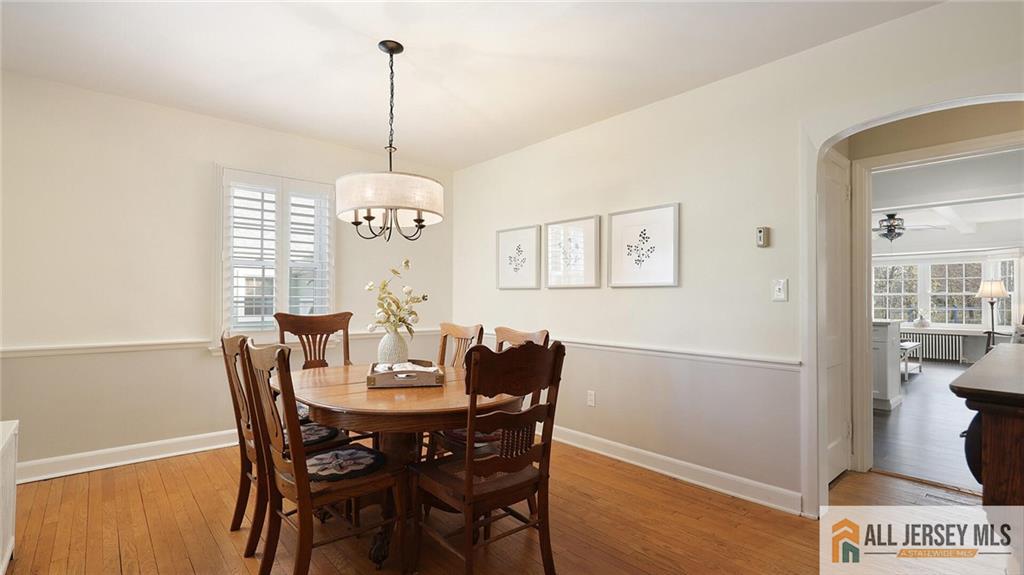 333 Melrose Avenue Middlesex, NJ 08846 - Photo 16 of 36 a view of a dining room with furniture window and wooden floor
