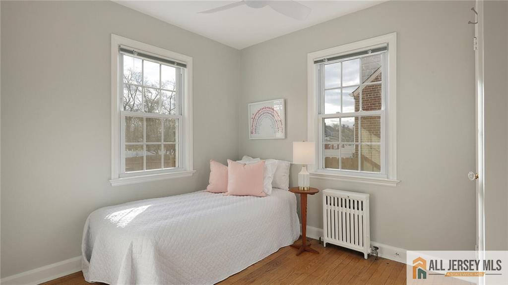 333 Melrose Avenue Middlesex, NJ 08846 - Photo 19 of 36 a bedroom with a bed and a window