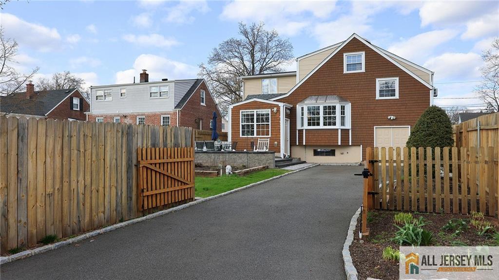 333 Melrose Avenue Middlesex, NJ 08846 - Photo 30 of 36 a front view of a house with a yard