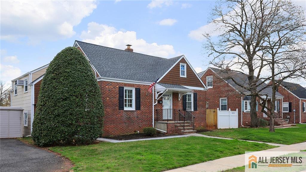333 Melrose Avenue Middlesex, NJ 08846 - Photo 3 of 36 a front view of a house with a yard