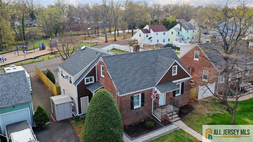 333 Melrose Avenue Middlesex, NJ 08846 - Photo 4 of 36 an aerial view of a house with garden space and sitting area