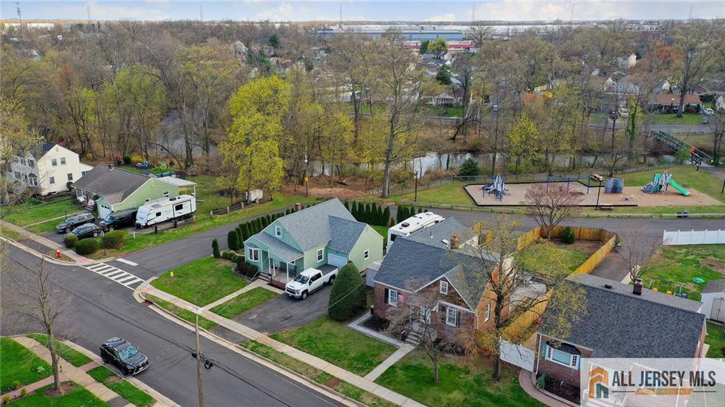 333 Melrose Avenue Middlesex, NJ 08846 - Photo 7 of 36 an aerial view of a house with a garden and lake view