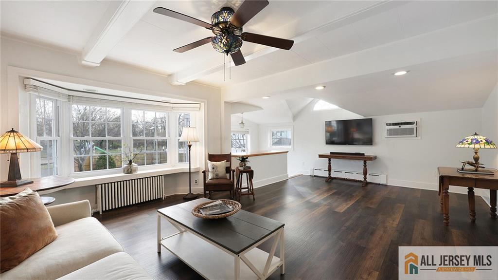 333 Melrose Avenue Middlesex, NJ 08846 - Photo 9 of 36 a living room with furniture and a window