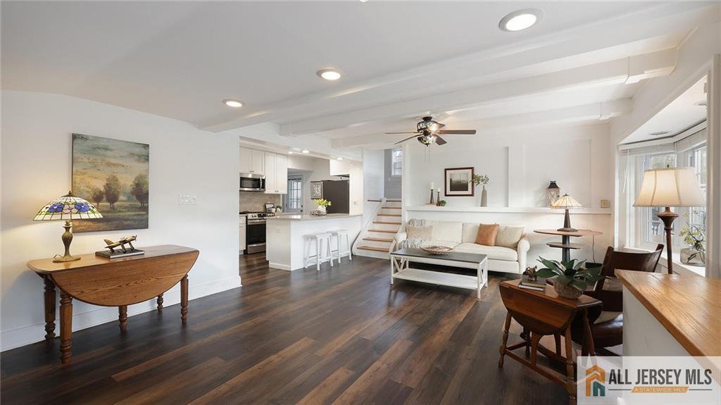 333 Melrose Avenue Middlesex, NJ 08846 - Photo 10 of 36 a living room with furniture kitchen view and a wooden floor