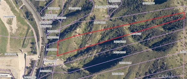 a view of entryway with wooden stairs