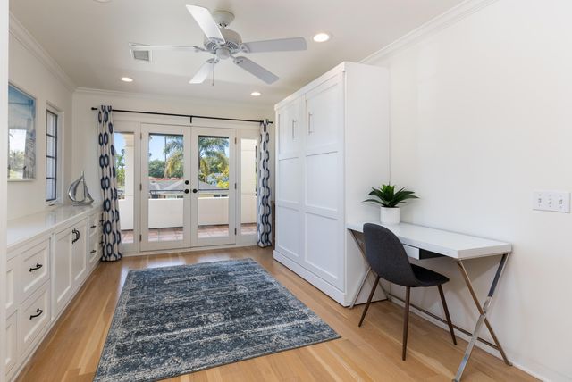 a bedroom with bed and window