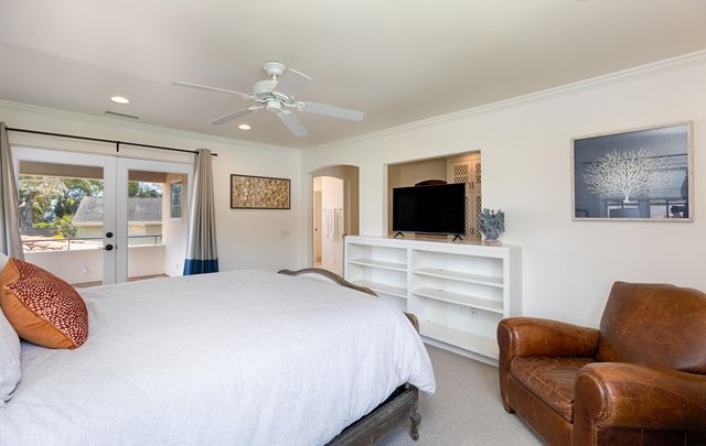 a view of swimming pool with outdoor seating and a patio