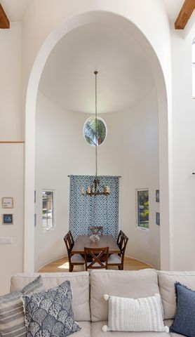 a living room with furniture fireplace and flat screen tv