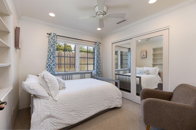 a spacious bathroom with a granite countertop tub sink and mirror