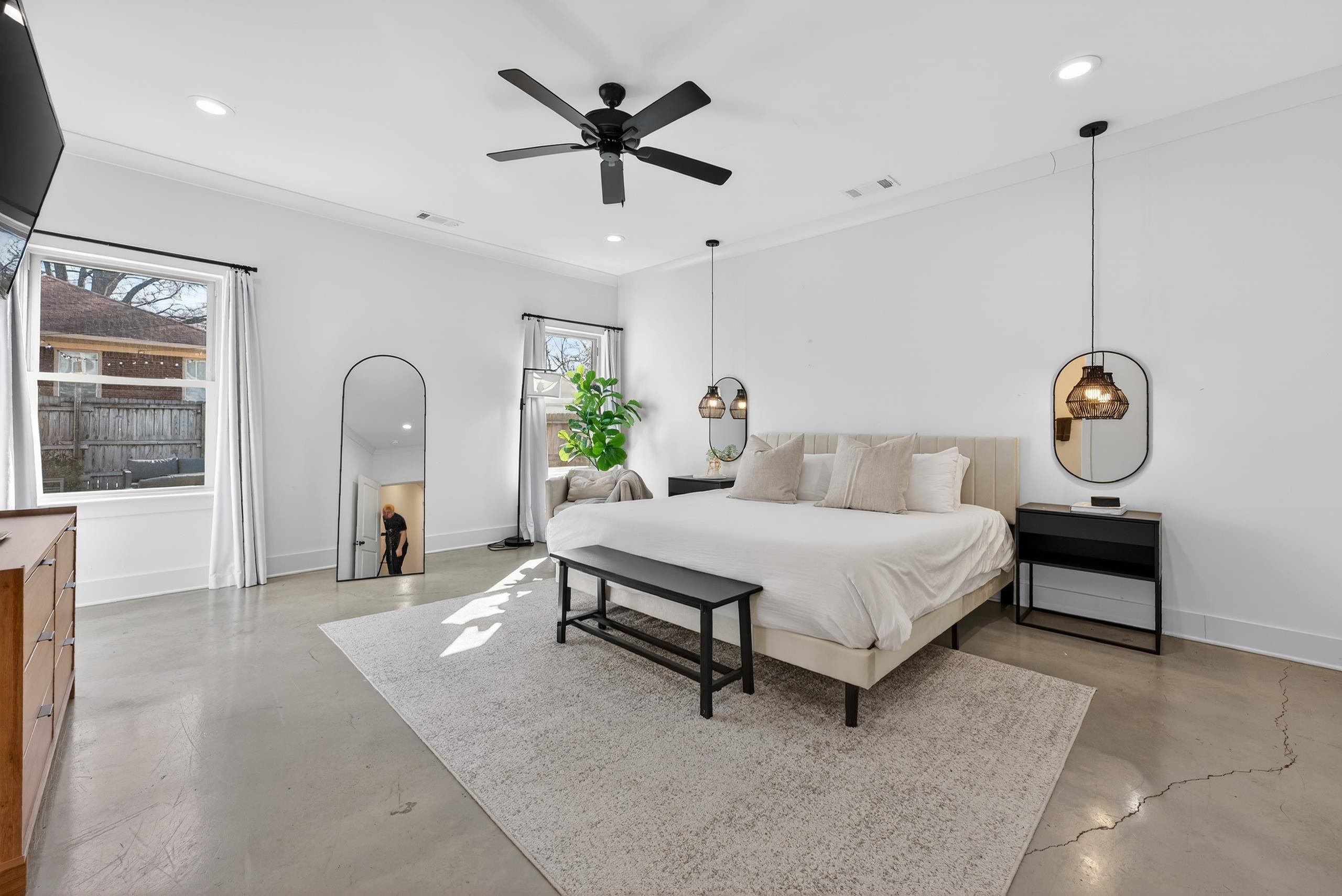 668 Hawthorne Street Memphis, TN 38107 - Photo 11 of 24 Bedroom with finished concrete floors, recessed lighting, ceiling fan, and crown molding
