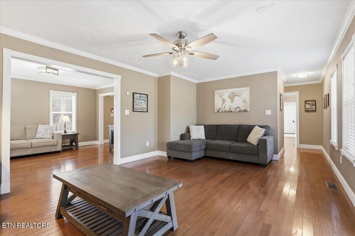 105 Carl Terry Road Wartburg, TN 37887 - Photo 11 of 55 a living room with furniture and a wooden floor
