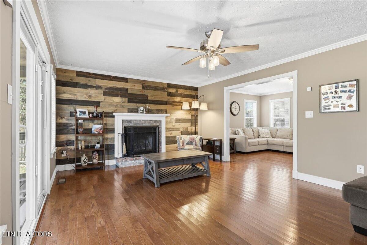 105 Carl Terry Road Wartburg, TN 37887 - Photo 12 of 55 a living room with furniture and a fireplace