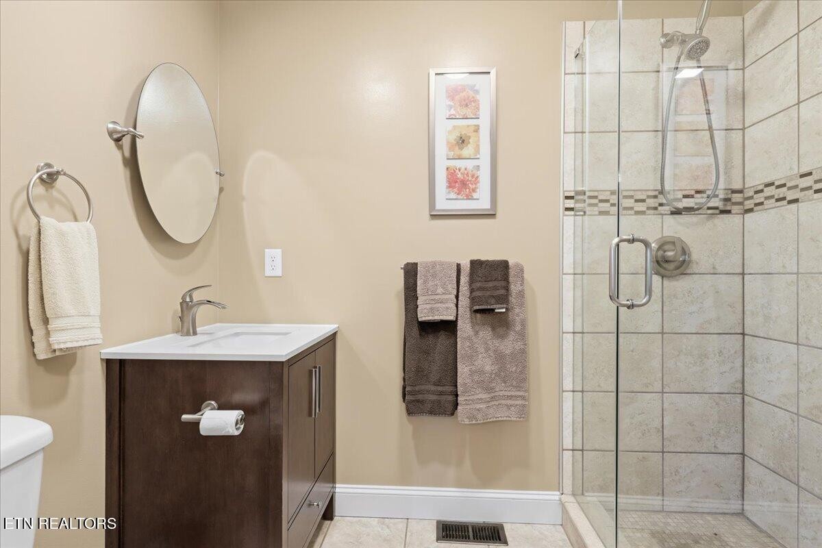 105 Carl Terry Road Wartburg, TN 37887 - Photo 17 of 55 a bathroom with a sink and mirror