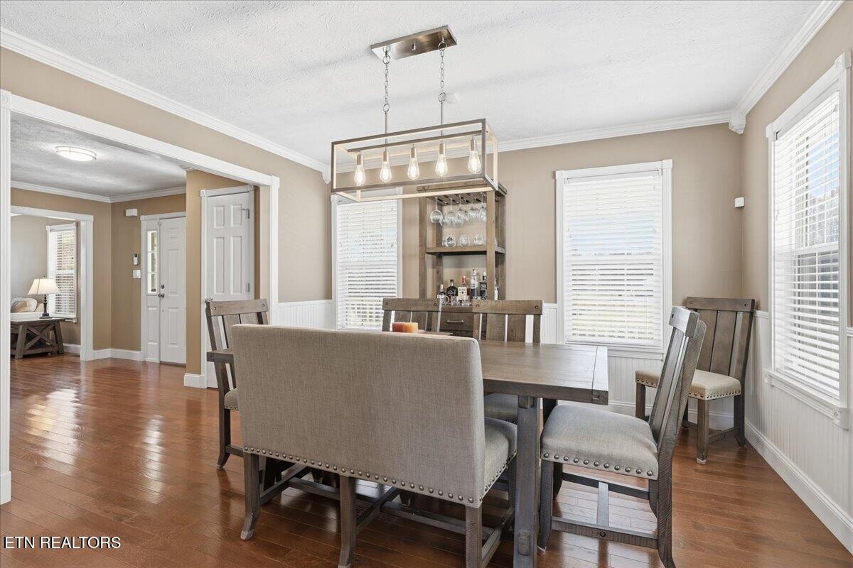 105 Carl Terry Road Wartburg, TN 37887 - Photo 19 of 55 a dining room with furniture window wooden floor