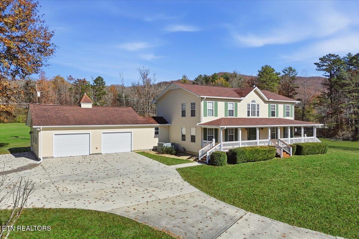 105 Carl Terry Road Wartburg, TN 37887 - Photo 2 of 55 a front view of a house with a yard