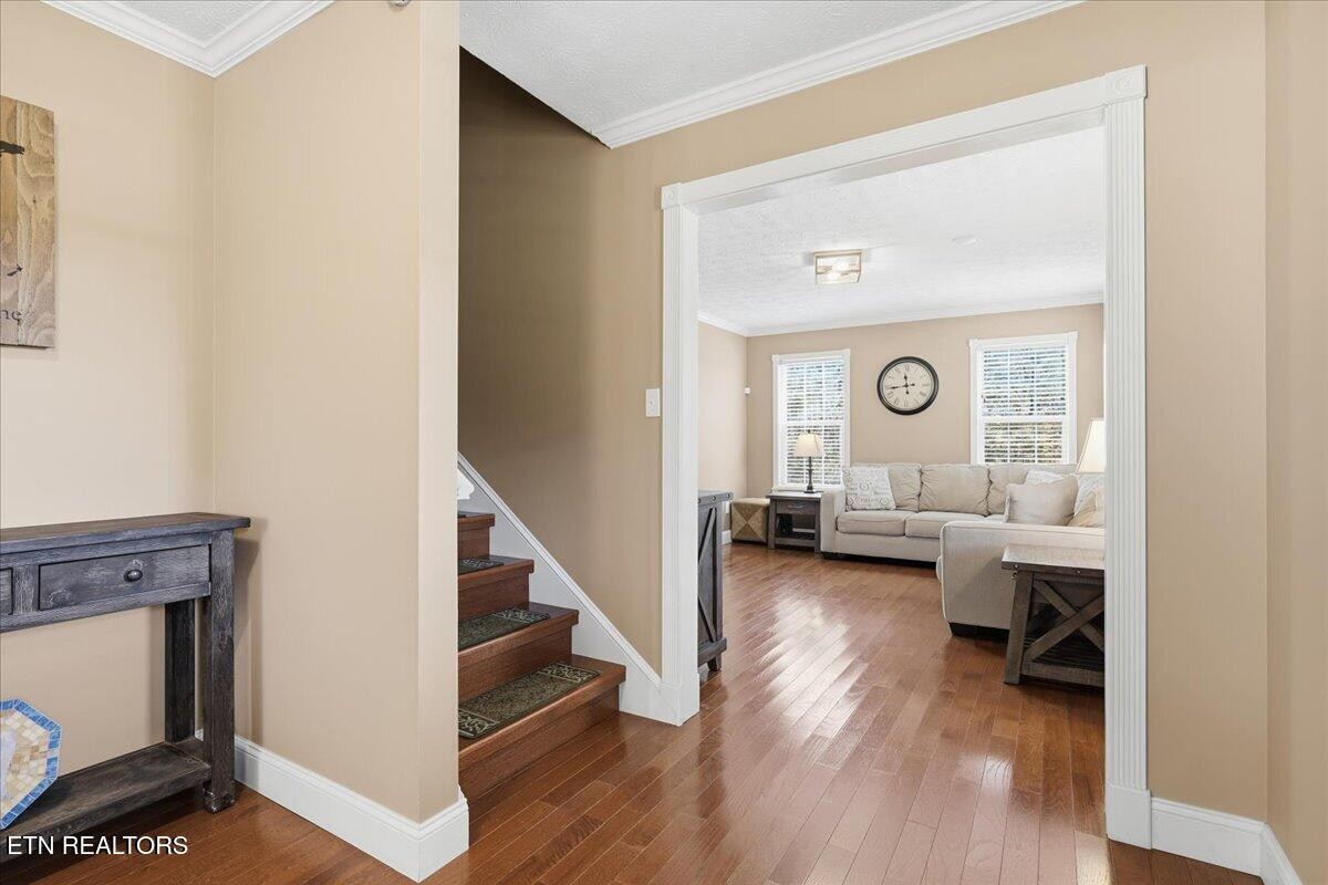105 Carl Terry Road Wartburg, TN 37887 - Photo 23 of 55 a living room with couches and a fireplace with wooden floor