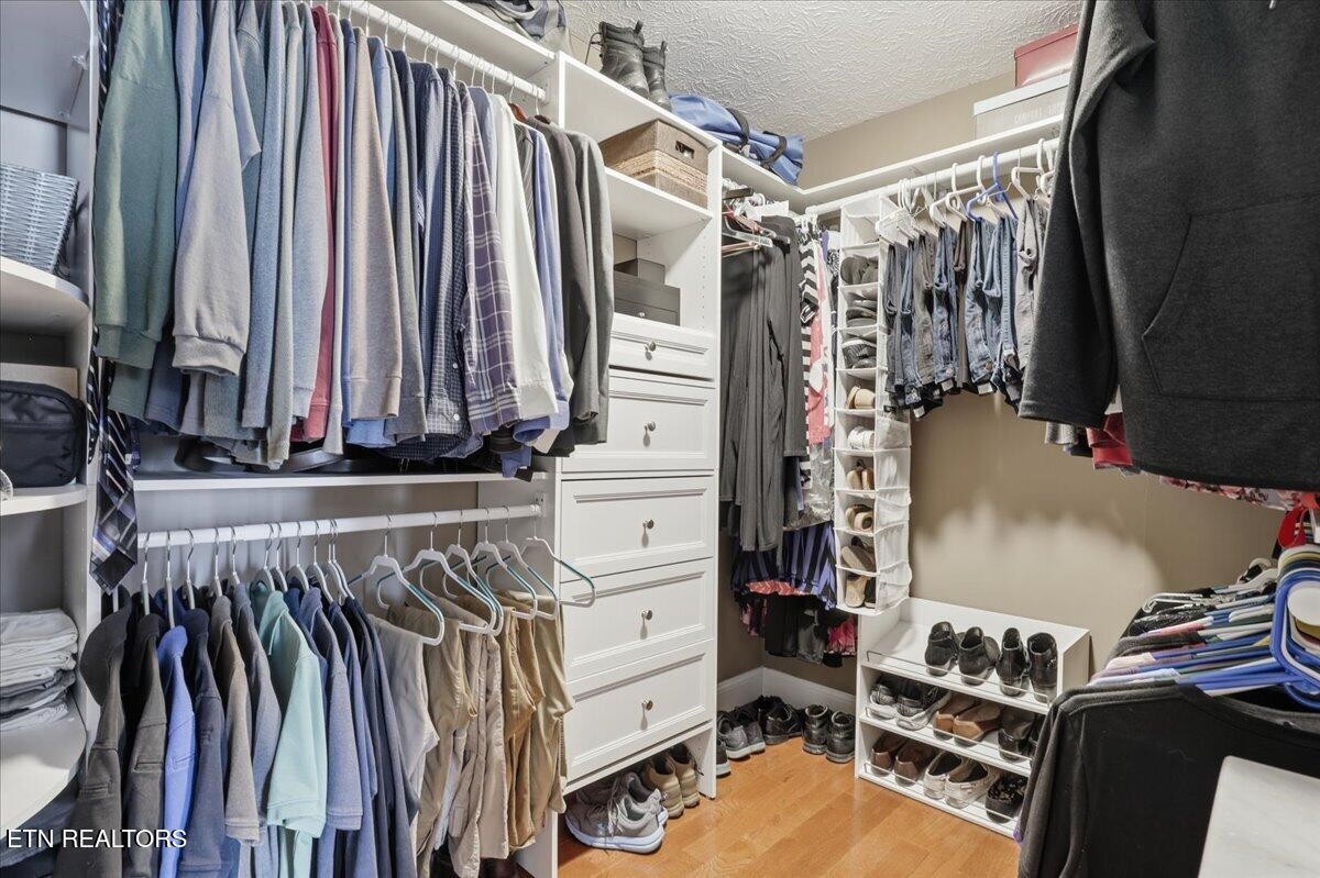 105 Carl Terry Road Wartburg, TN 37887 - Photo 28 of 55 a view of walk in closet with clothes and shoes