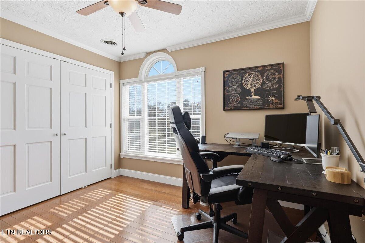 105 Carl Terry Road Wartburg, TN 37887 - Photo 32 of 55 a view of a workspace with furniture and a window