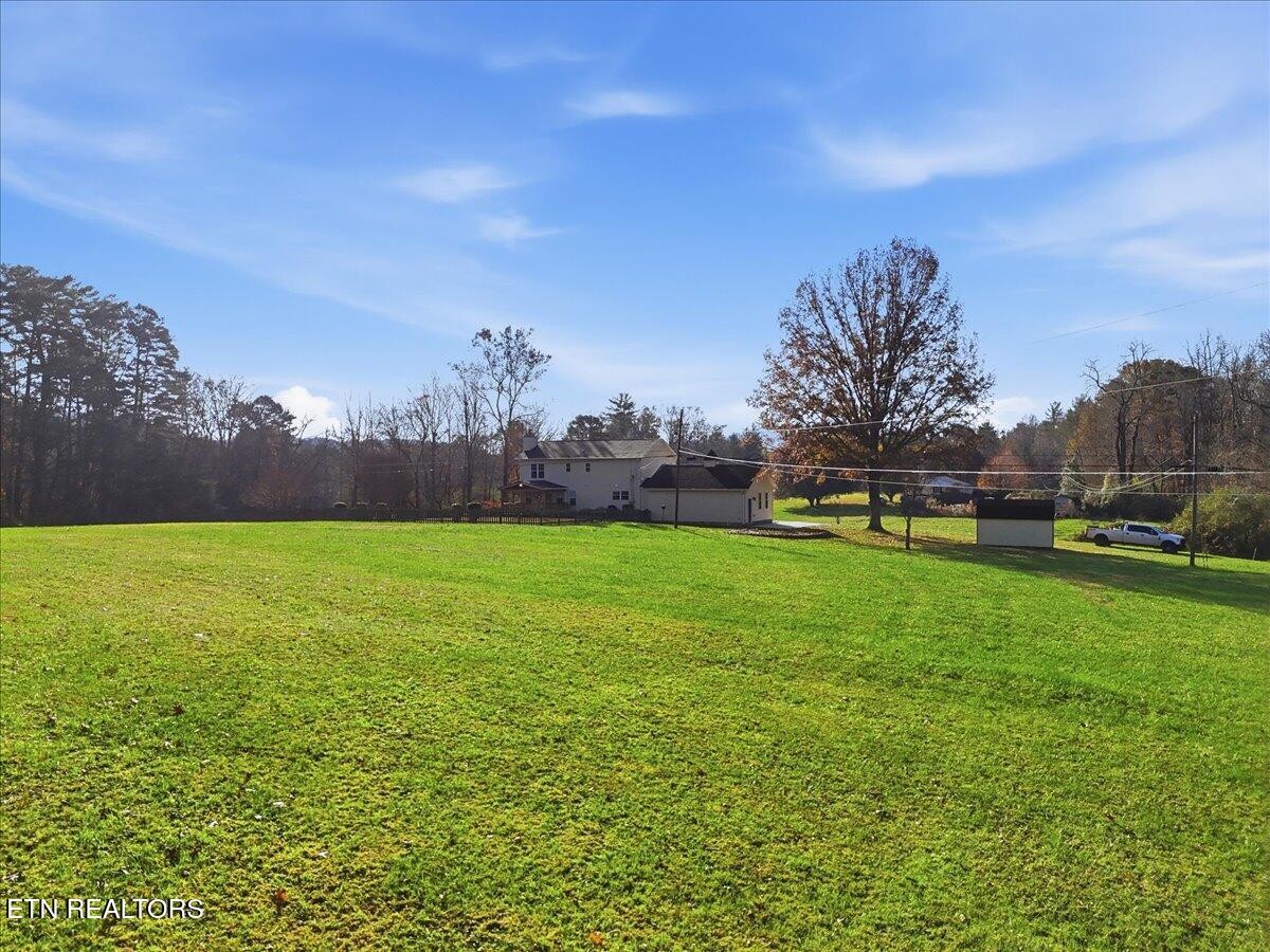 105 Carl Terry Road Wartburg, TN 37887 - Photo 41 of 55 a view of green field with house in background