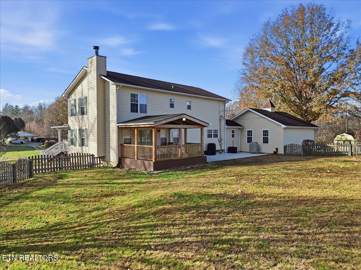 105 Carl Terry Road Wartburg, TN 37887 - Photo 52 of 55 a front view of a house with a big yard
