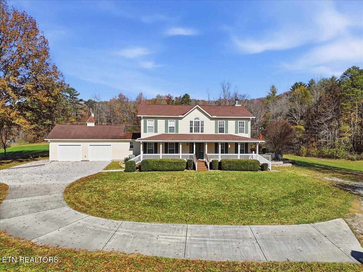 105 Carl Terry Road Wartburg, TN 37887 - Photo 55 of 55 front view of a house with a garden