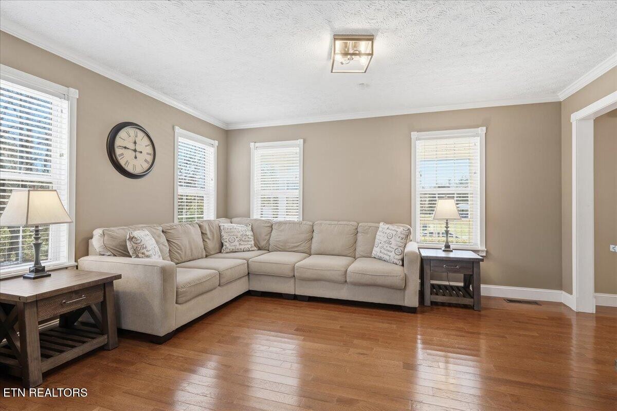 105 Carl Terry Road Wartburg, TN 37887 - Photo 9 of 55 a living room with furniture and a large window