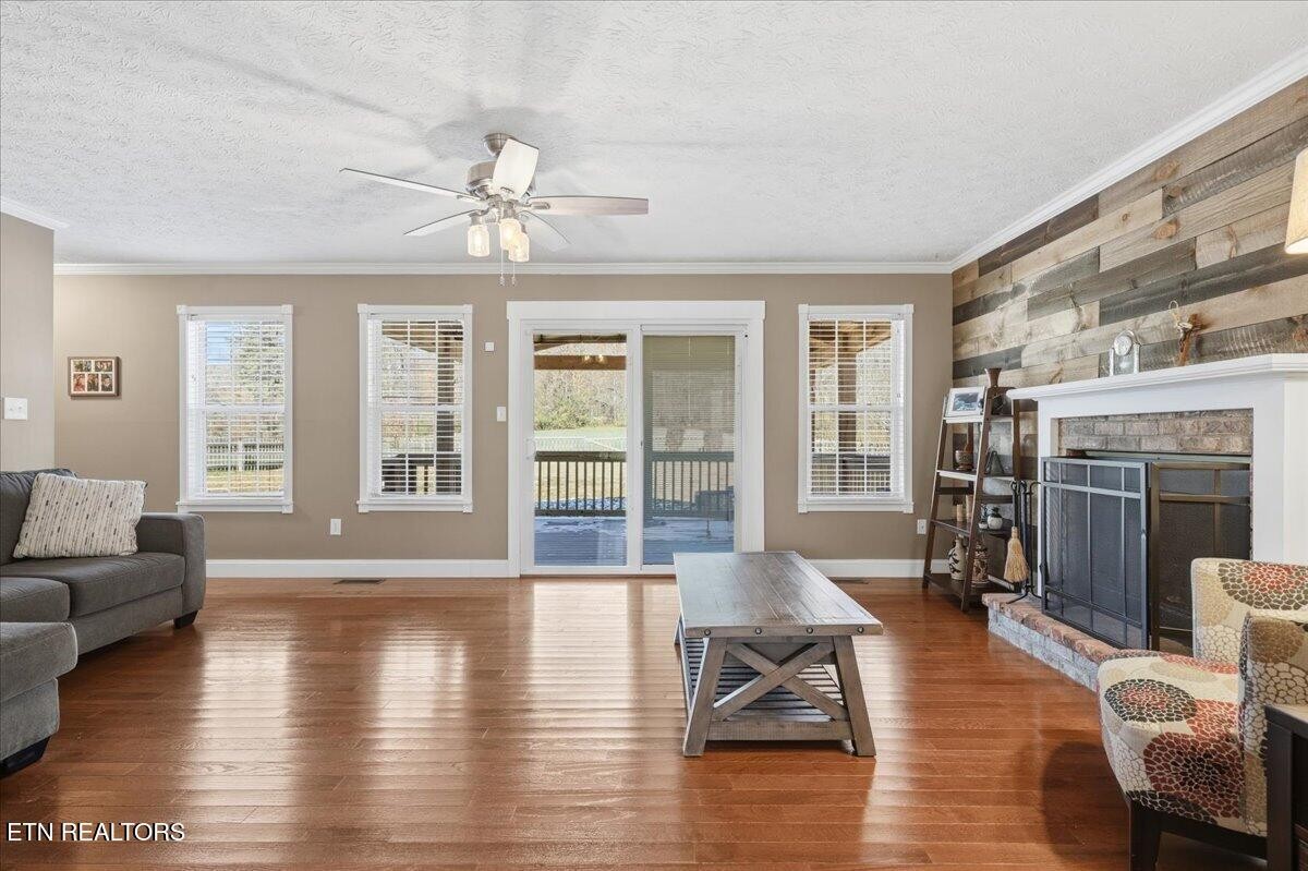 105 Carl Terry Road Wartburg, TN 37887 - Photo 10 of 55 a living room with furniture large window and wooden floor