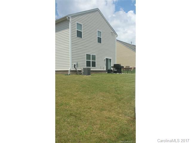 1006 Green Terra Road Indian Trail, NC 28079 - Photo 2 of 11 a backyard of a house