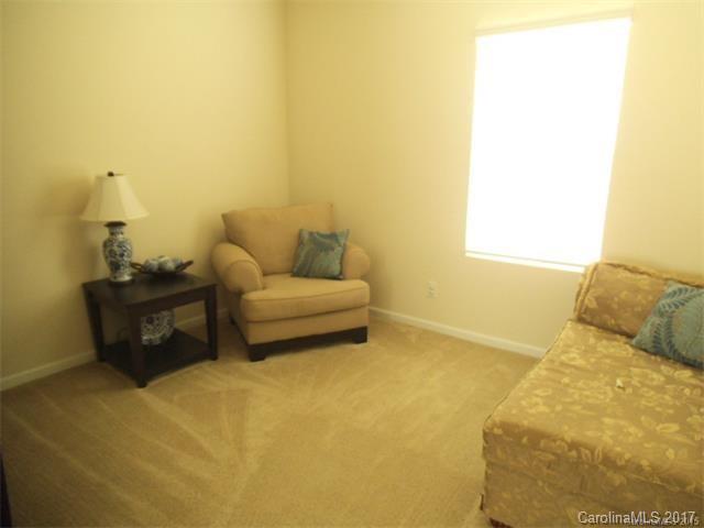 1006 Green Terra Road Indian Trail, NC 28079 - Photo 6 of 11 a bedroom with a bed and a couch