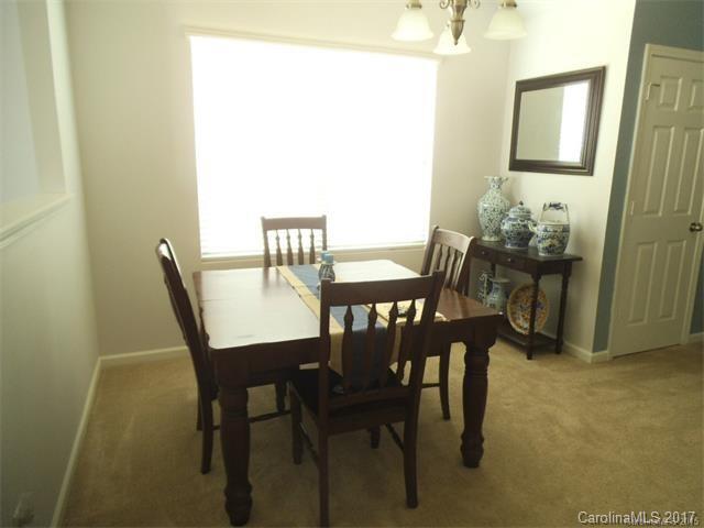 1006 Green Terra Road Indian Trail, NC 28079 - Photo 7 of 11 a view of a dining room with furniture and window