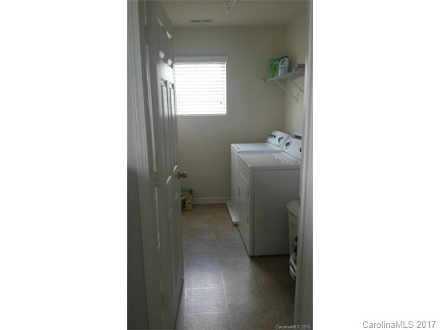 1006 Green Terra Road Indian Trail, NC 28079 - Photo 9 of 11 a utility room with a washer and dryer